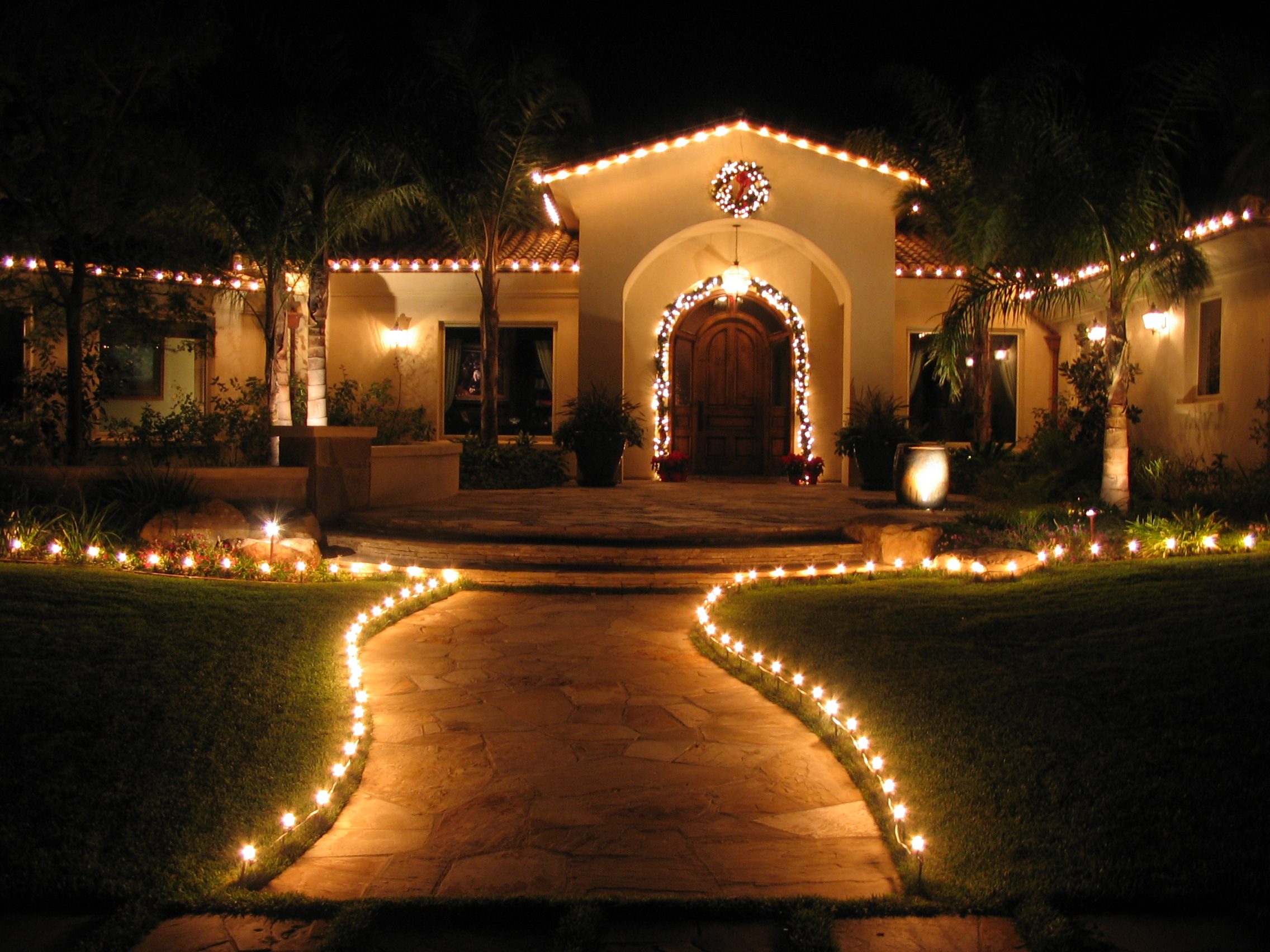 Professional Christmas Lighting on home and walkway.